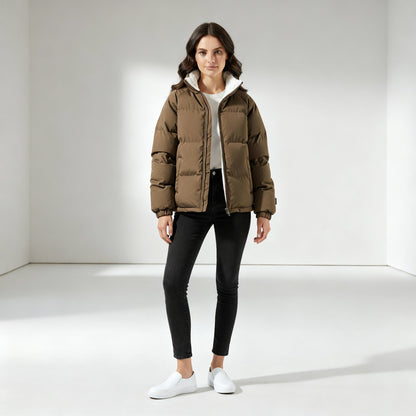 Full length view of the taupe puffer jacket with black jeans