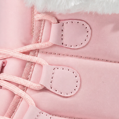 Lace loop and faux fur cuff detail on a pink snow boot