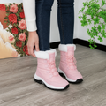 Pink fleece lined platform snow boots with faux fur cuffs