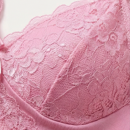 Close-up of the floral lace cup on a pink cami
