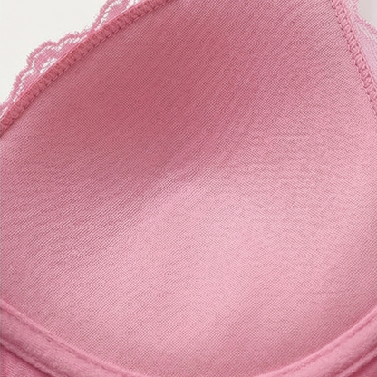 Close-up of the satin cup lining on a pink cami