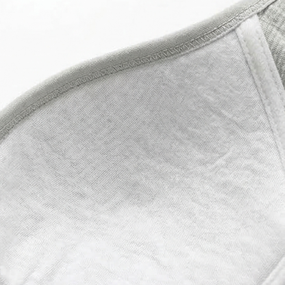 White cotton lining inside a grey ribbed bra