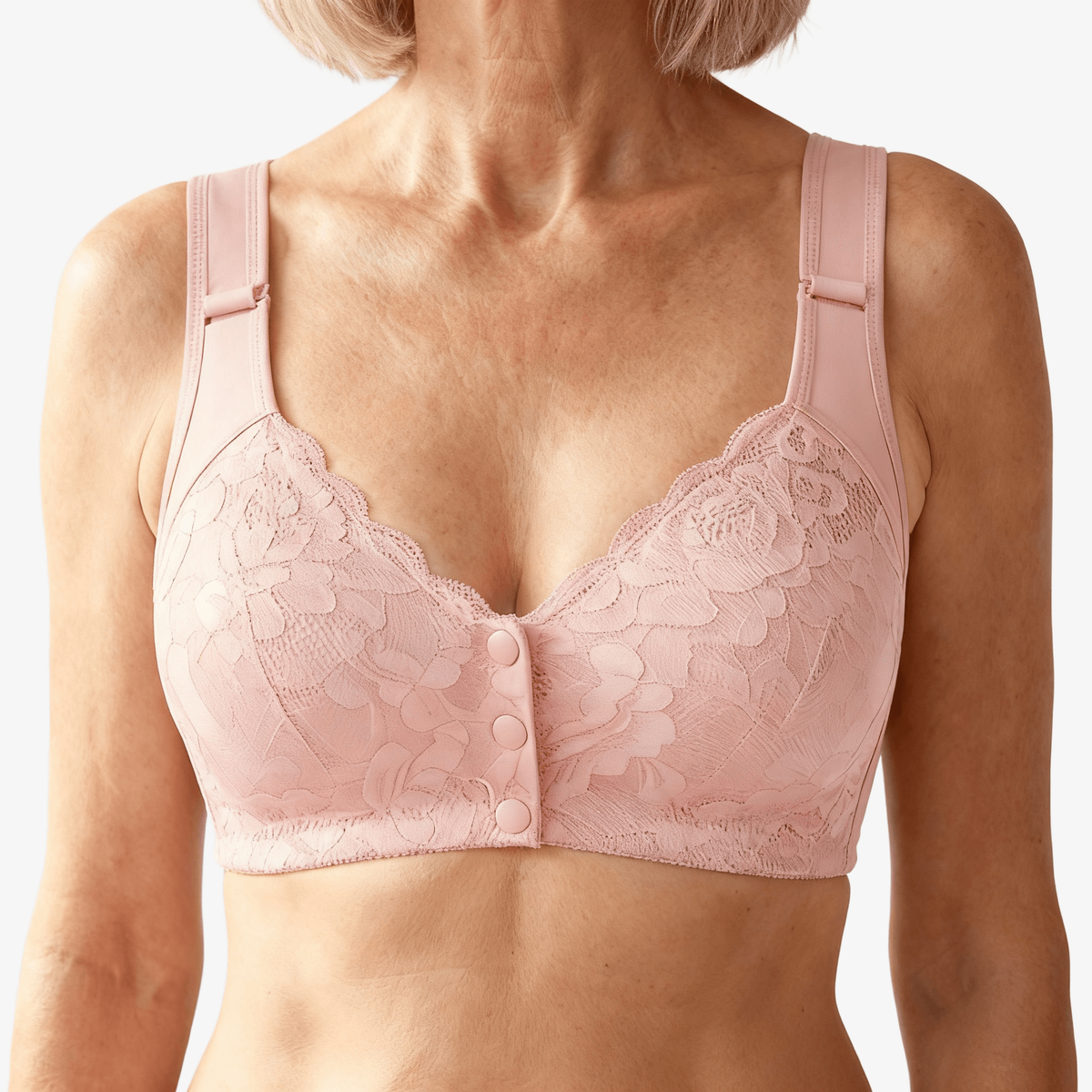 Blush front-snap lace bra worn on a body