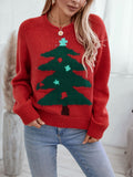 Red knit sweater with a green intarsia Christmas tree on the front