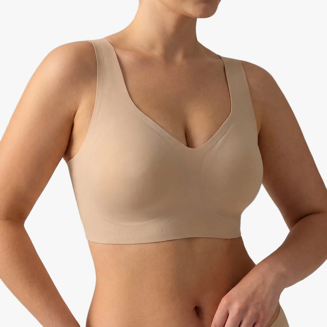 Nude wireless bra with a V neckline and wide smoothing band