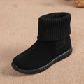 Black suede ankle booties with a folded ribbed knit cuff