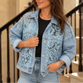 Light wash denim jacket with floral lace patchwork panels