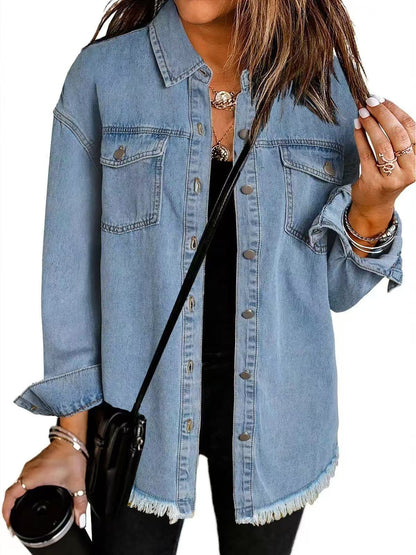 Light wash longline denim jacket with a frayed hem