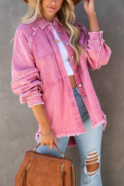 Pink oversized frayed denim shirt jacket worn with ripped jeans