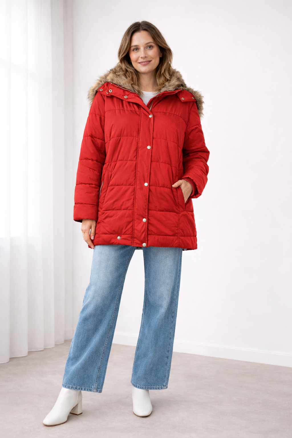 Red quilted snap-front jacket with a faux fur trimmed hood