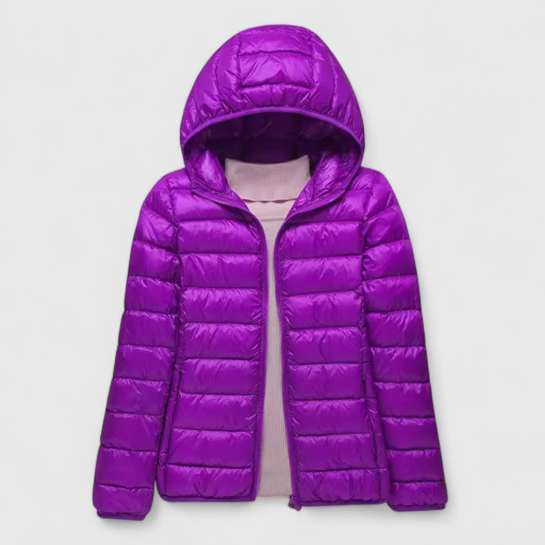 Purple lightweight quilted puffer jacket with a hood, flat lay