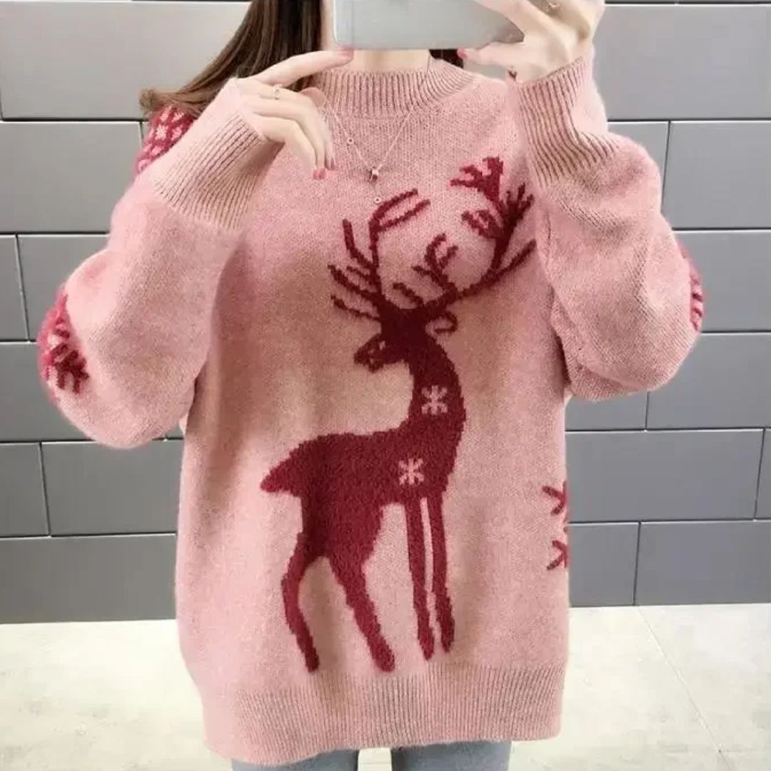 Pink brushed knit sweater with a burgundy reindeer silhouette