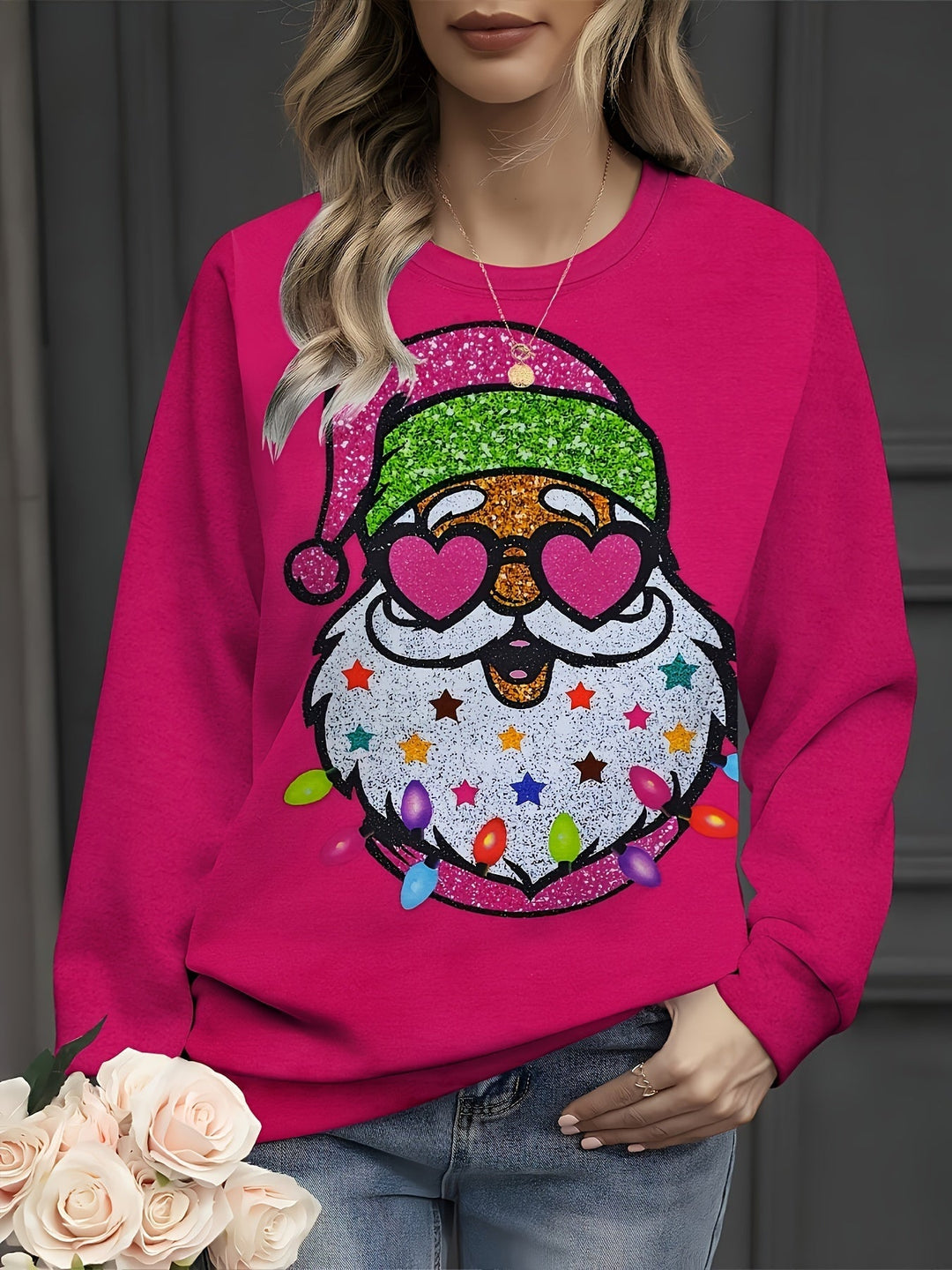 Hot pink crew neck sweatshirt with a glittery Santa graphic