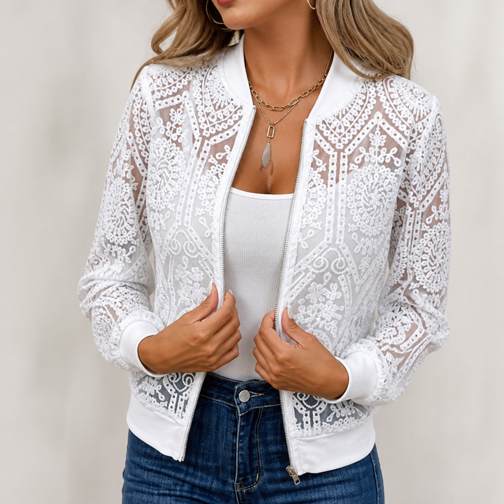 White sheer lace bomber jacket worn open with jeans
