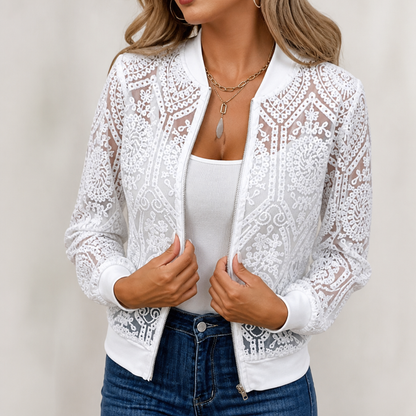 White sheer lace bomber jacket worn open with jeans