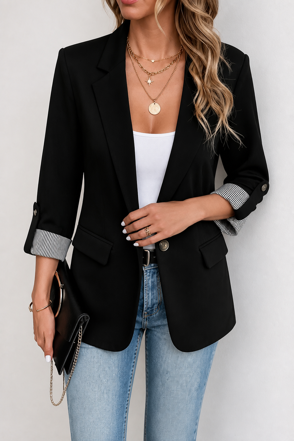 Black blazer with roll sleeves and striped cuff linings