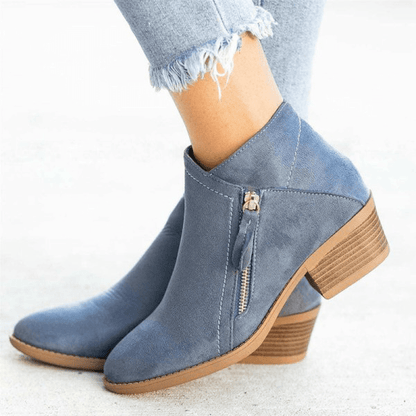 Denim blue suede ankle boots with a side zip and stacked heel
