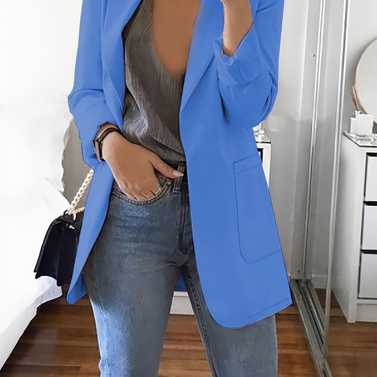 Cornflower blue tailored longline blazer worn open over jeans