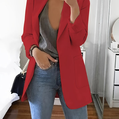 Red tailored longline blazer worn open over jeans