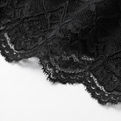 Scalloped black lace hem on the peplum cami
