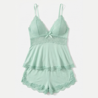 Mint green lace peplum cami and shorts set laid flat