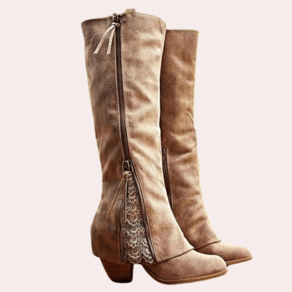 Pair of tan knee high riding boots with side zip, lace panel and block heel
