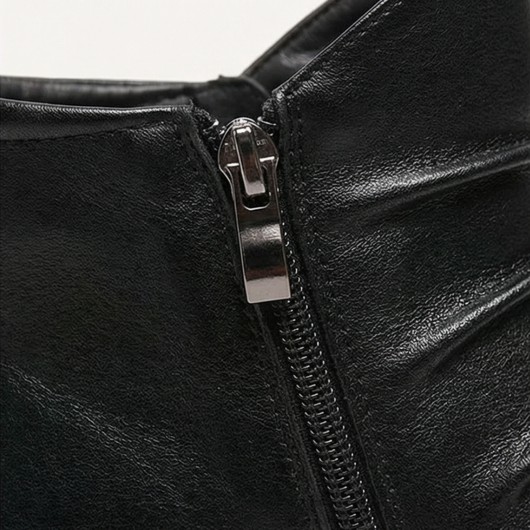 Side zip detail on a black ruched ankle boot