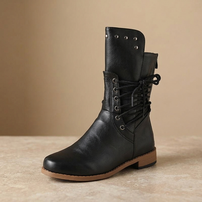 Black studded lace up ankle boot with a low stacked heel, side view