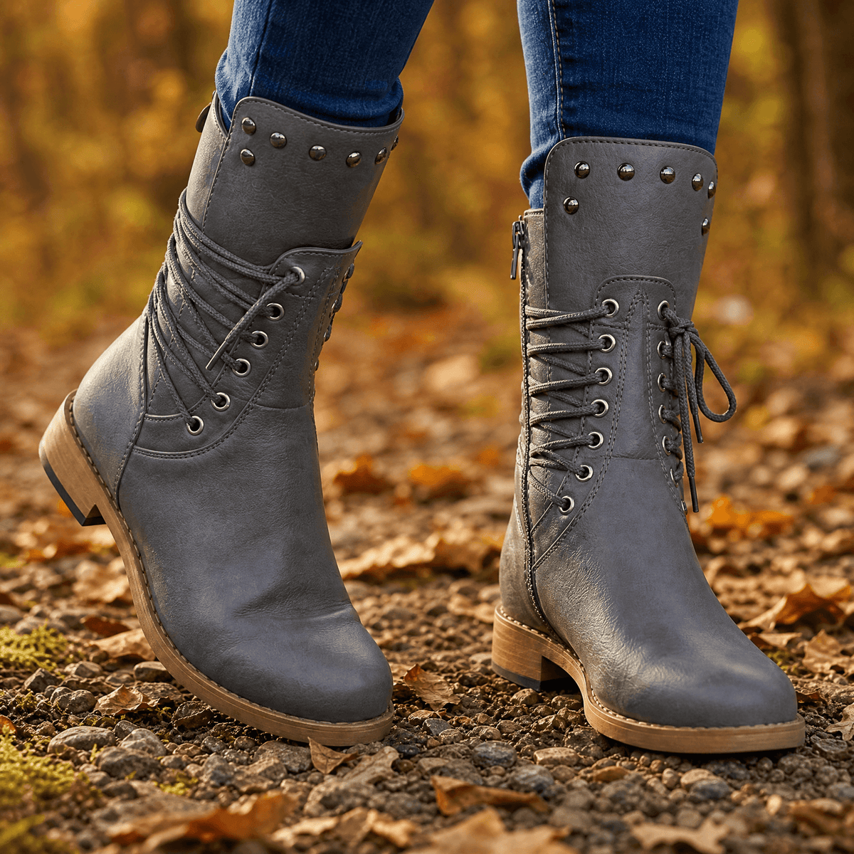 Grey studded lace up mid calf boots with side zip, worn with jeans outdoors