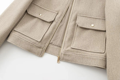 Close view of the flap pockets and zip